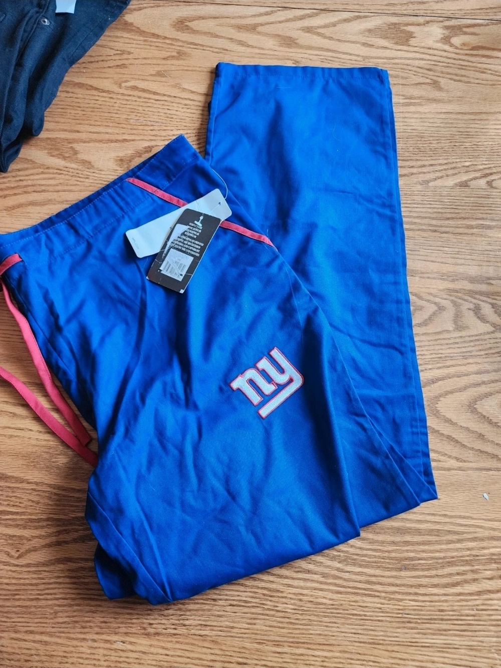 NWT NFL Team Apparel Blue Garment with Logo Tag